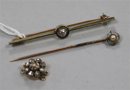 A yellow metal and diamond set bar brooch, a stick pin, and a rose cut diamond set clasp.
